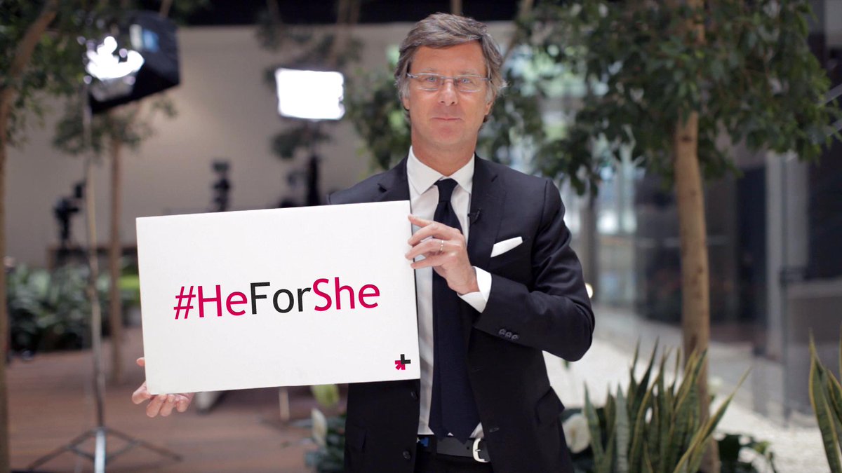 member of Accor holding a HeForShe sign